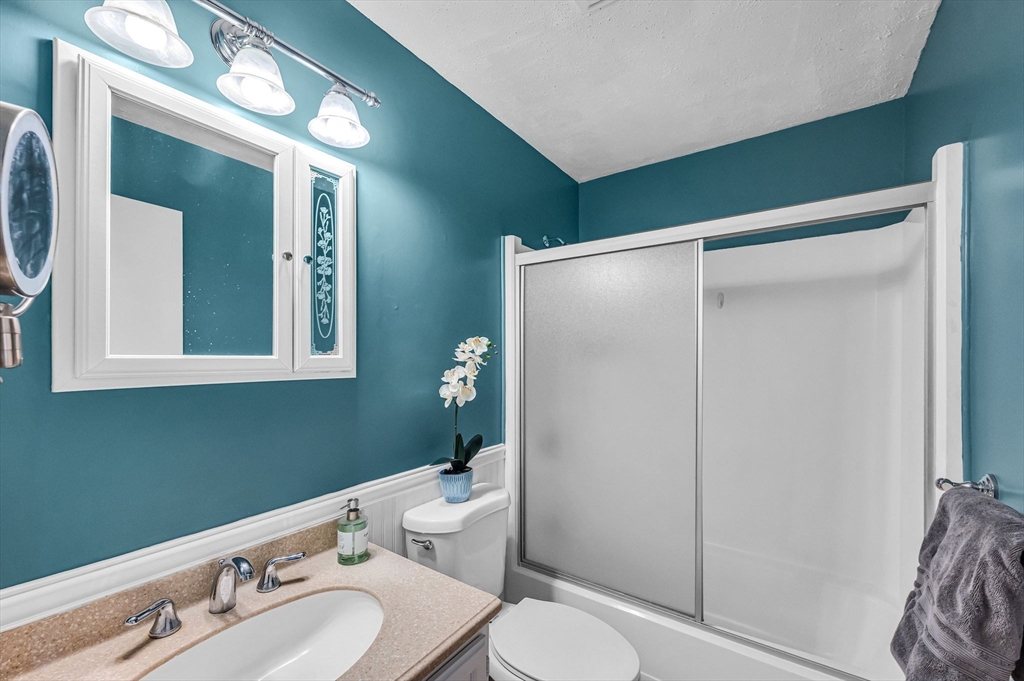 315 East Street South Suffield, CT 06078 - Photo 12 of 31 a bathroom with a sink mirror vanity and toilet
