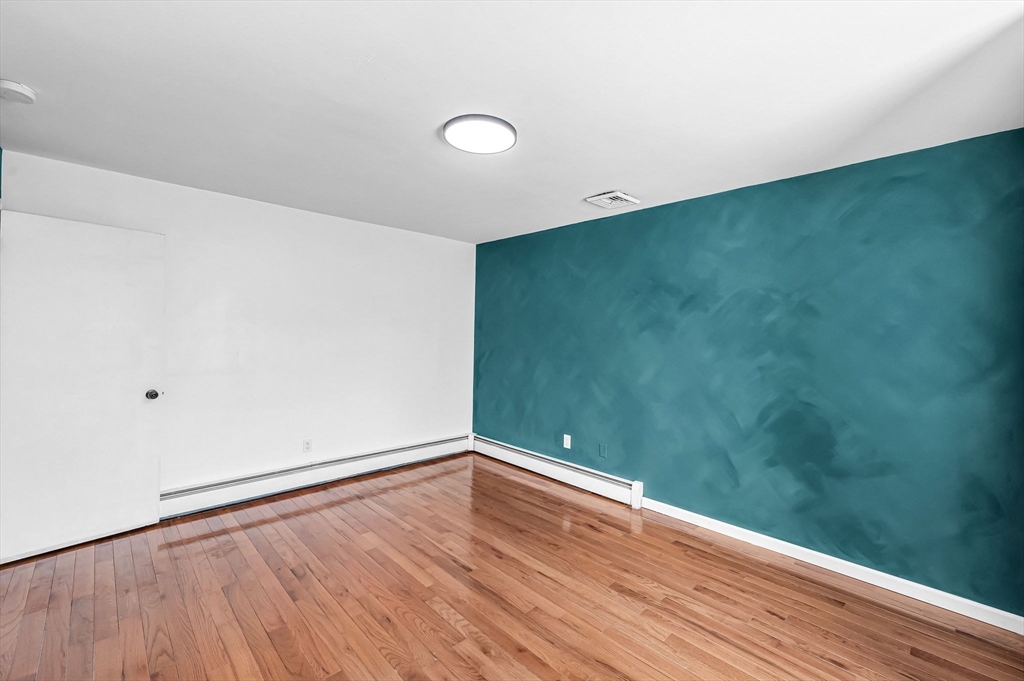 315 East Street South Suffield, CT 06078 - Photo 18 of 31 a view of empty room with wooden floor
