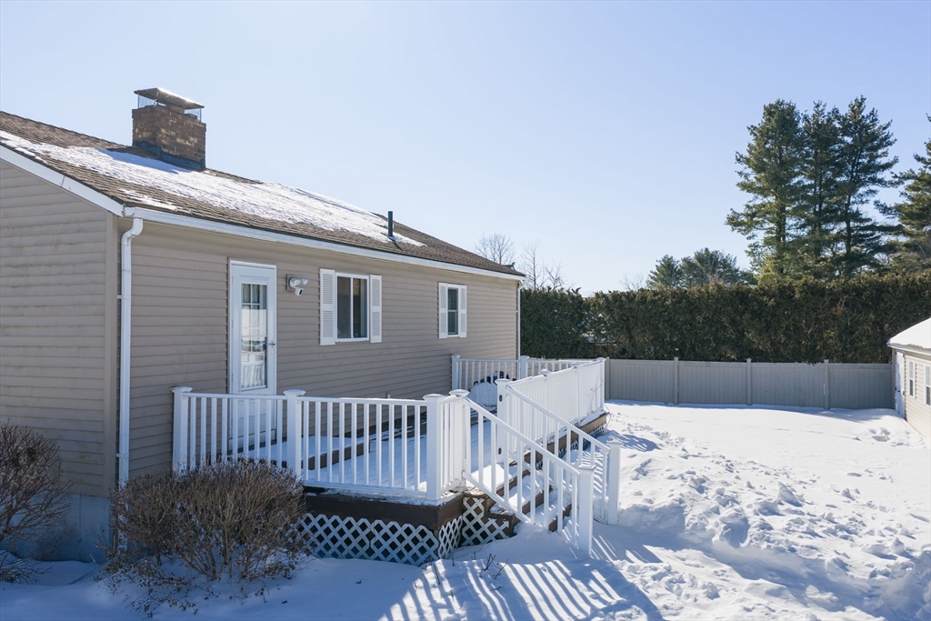 315 East Street South Suffield, CT 06078 - Photo 26 of 31 a view of a roof deck with chair and wooden floor
