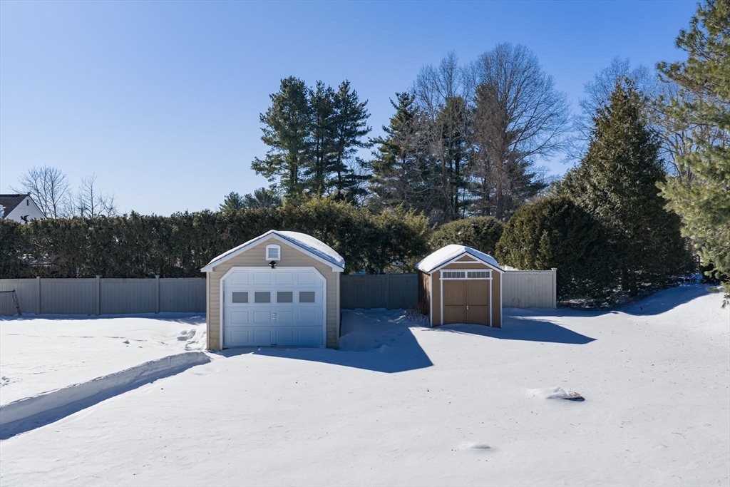 315 East Street South Suffield, CT 06078 - Photo 27 of 31 a front view of a house with a yard covered in snow