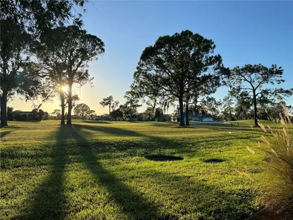 a view of a swimming pool with an ocean view
