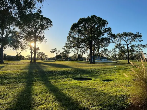 a view of a swimming pool with an ocean view