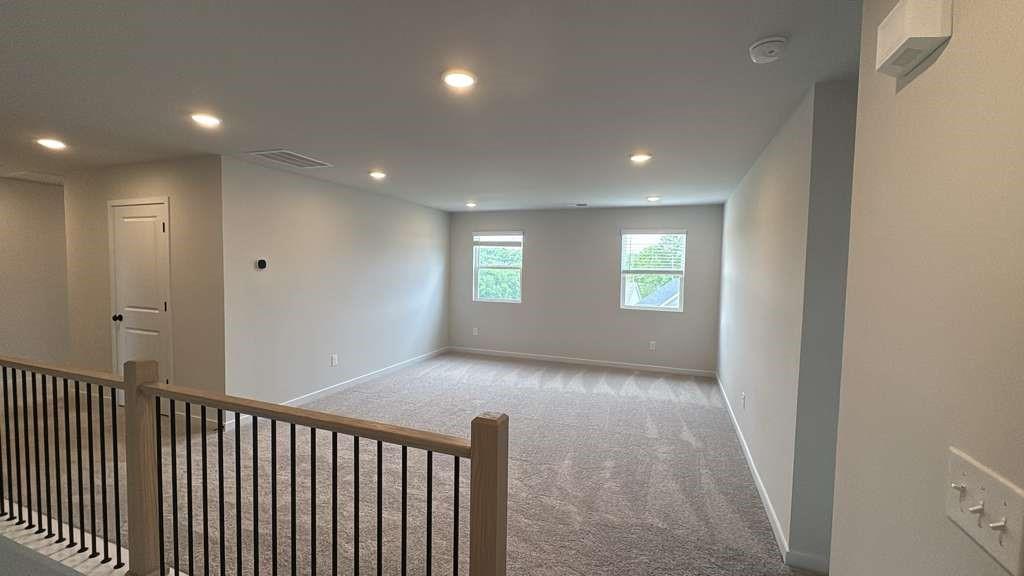 2666 Harbor Rdg Pass Gainesville, GA 30507 - Photo 14 of 41 a view of hallway with window and stairs