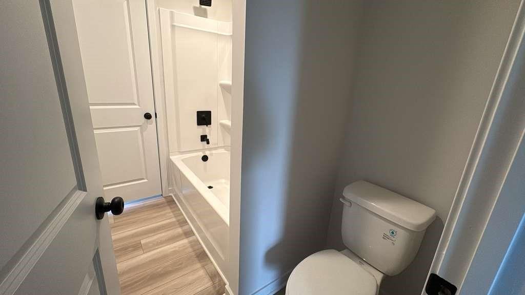 2666 Harbor Rdg Pass Gainesville, GA 30507 - Photo 21 of 41 a bathroom with a toilet and a shower