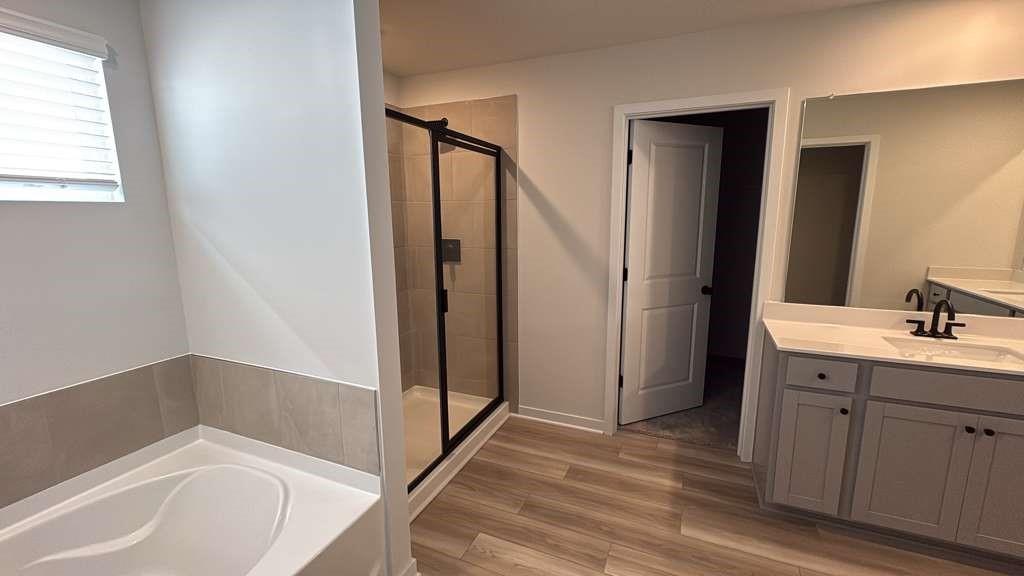 2666 Harbor Rdg Pass Gainesville, GA 30507 - Photo 27 of 41 a bathroom with a bathtub and a sink