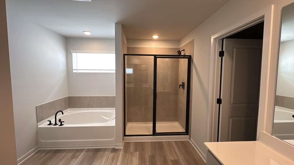 2666 Harbor Rdg Pass Gainesville, GA 30507 - Photo 30 of 41 a bathroom with a bathtub and a shower