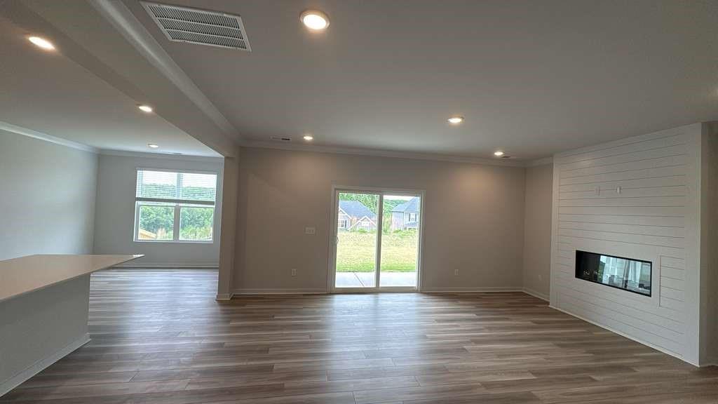 2666 Harbor Rdg Pass Gainesville, GA 30507 - Photo 4 of 41 an empty room with wooden floor and windows