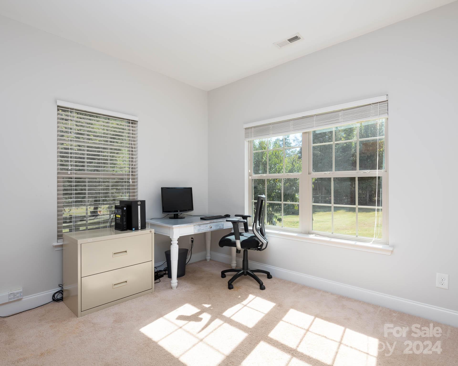 706 Houston Road Troutman, NC 28166 - Photo 23 of 39 a view of a workspace with a window