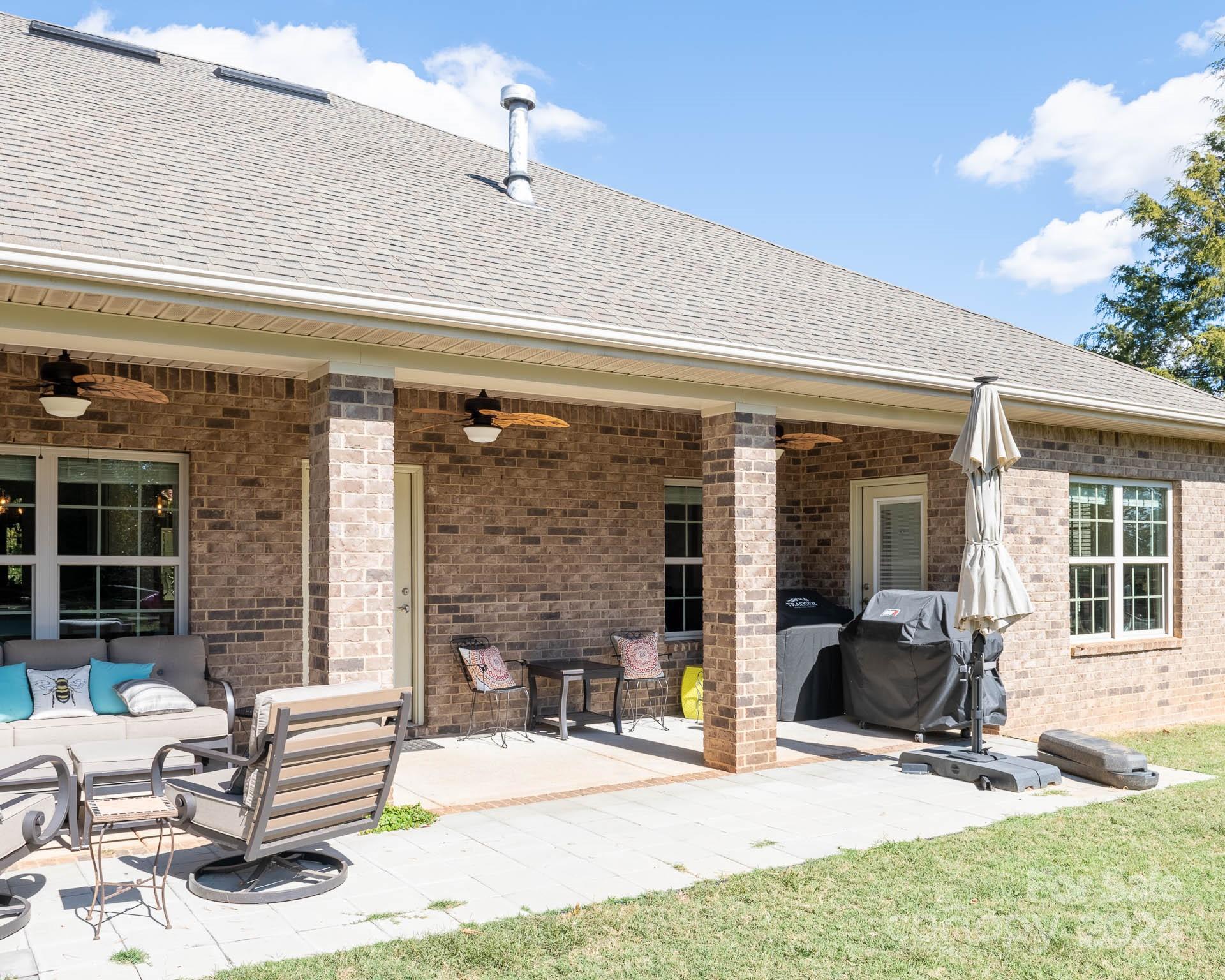706 Houston Road Troutman, NC 28166 - Photo 28 of 39 a view of a lounge chairs in the patio
