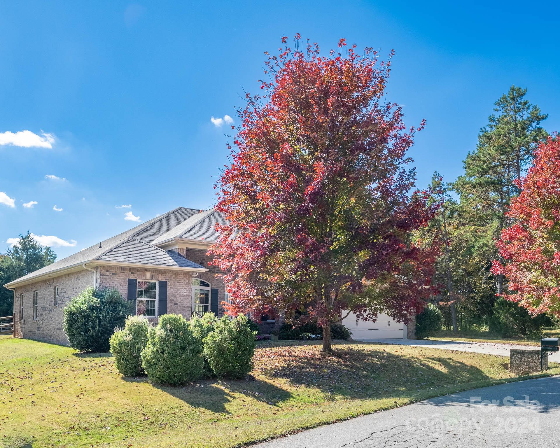 706 Houston Road Troutman, NC 28166 - Photo 39 of 39 a front view of a house with a yard