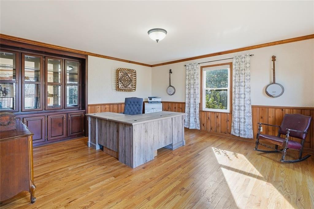 205 Hart Circle Dallas, GA 30132 - Photo 12 of 44 a view of a bedroom with furniture window and wooden floor