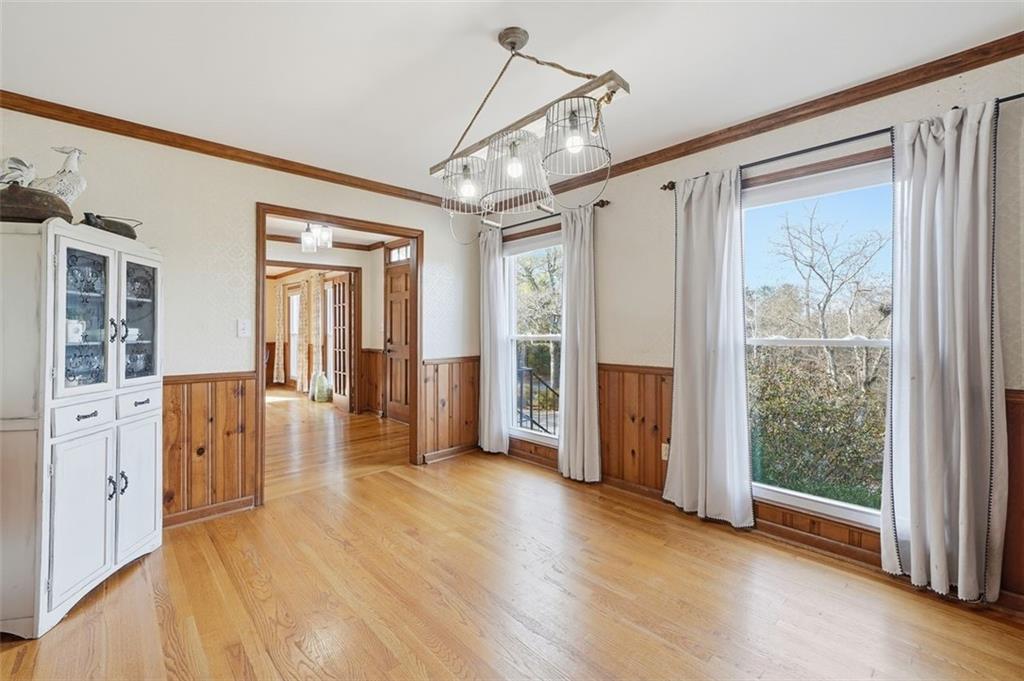 205 Hart Circle Dallas, GA 30132 - Photo 16 of 44 a view of a big room with wooden floor and windows