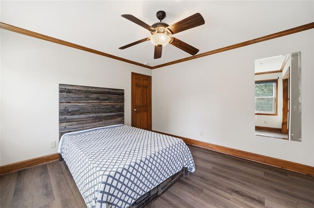 205 Hart Circle Dallas, GA 30132 - Photo 22 of 44 a bedroom with bed and window