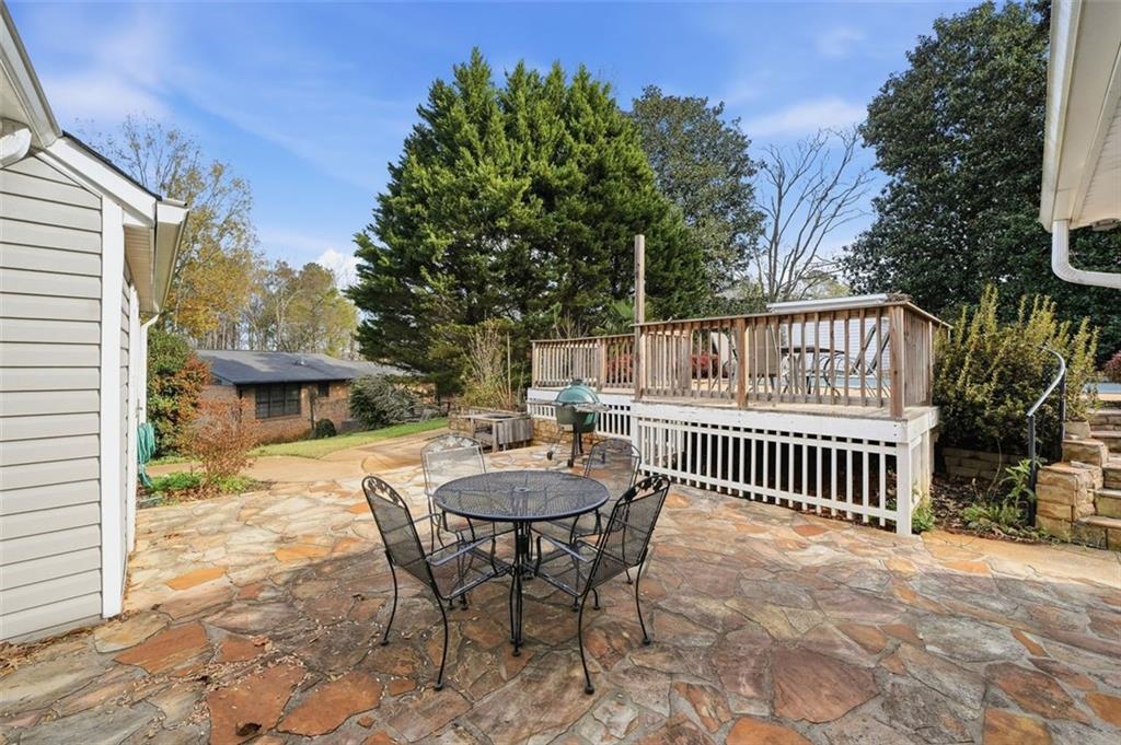 205 Hart Circle Dallas, GA 30132 - Photo 32 of 44 a view of a chair and table in the patio