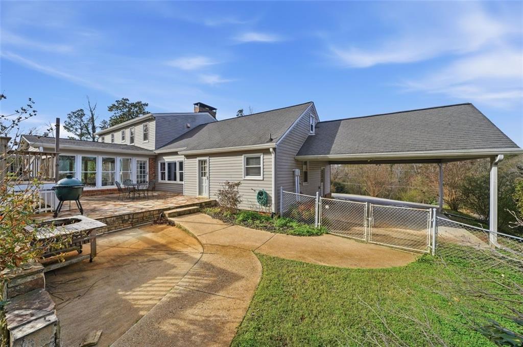 205 Hart Circle Dallas, GA 30132 - Photo 33 of 44 a house view with a garden space