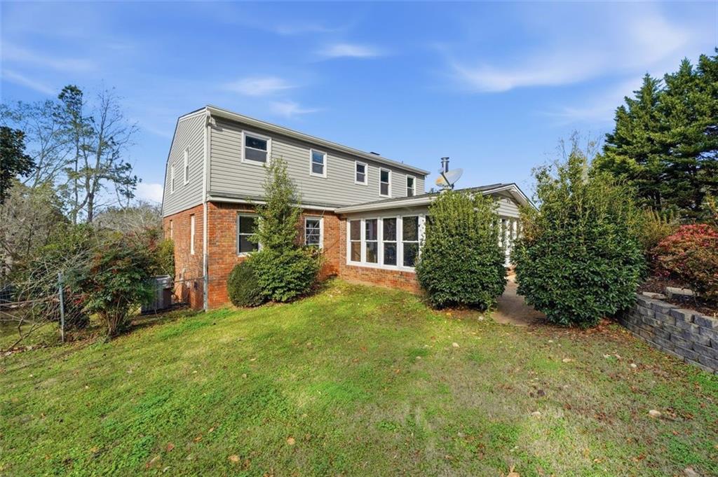 205 Hart Circle Dallas, GA 30132 - Photo 34 of 44 a front view of a house with a yard