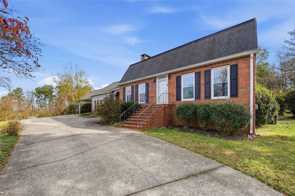 205 Hart Circle Dallas, GA 30132 - Photo 42 of 44 a view of a house with a yard