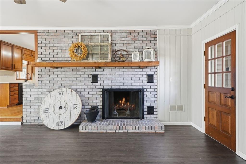 205 Hart Circle Dallas, GA 30132 - Photo 6 of 44 a living room with furniture and a fireplace