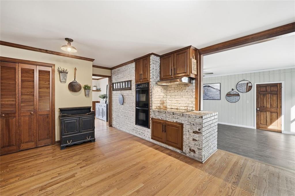205 Hart Circle Dallas, GA 30132 - Photo 8 of 44 a kitchen with stainless steel appliances granite countertop a stove and a refrigerator