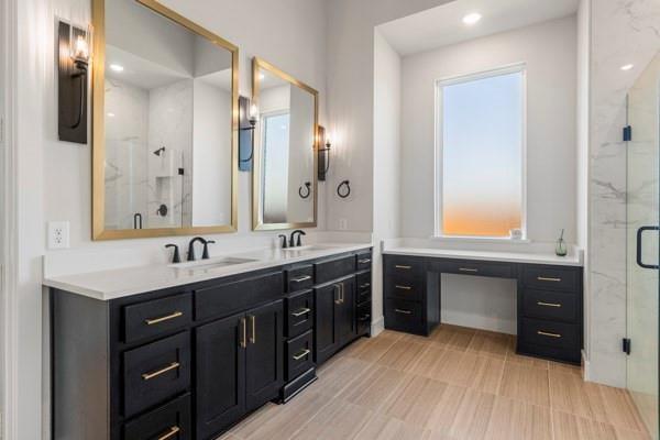 2432 Rose Run Way Celina, TX 75009 - Photo 19 of 26 a spacious bathroom with a double vanity sink and a mirror