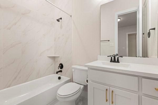 2432 Rose Run Way Celina, TX 75009 - Photo 25 of 26 a bathroom with a sink a toilet and a bathtub