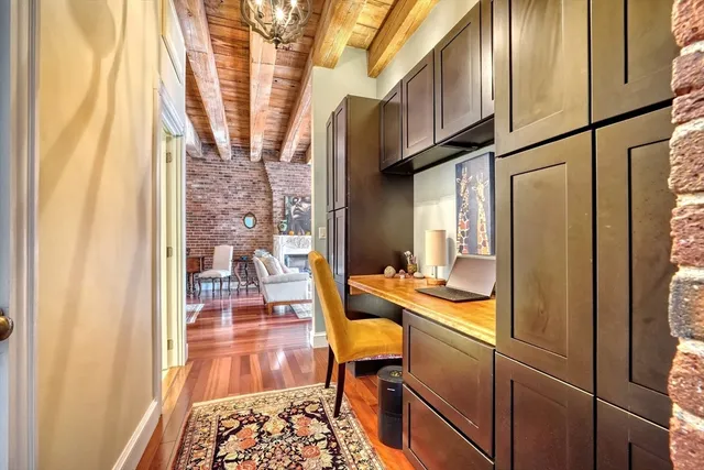 a bedroom with a bed and dresser