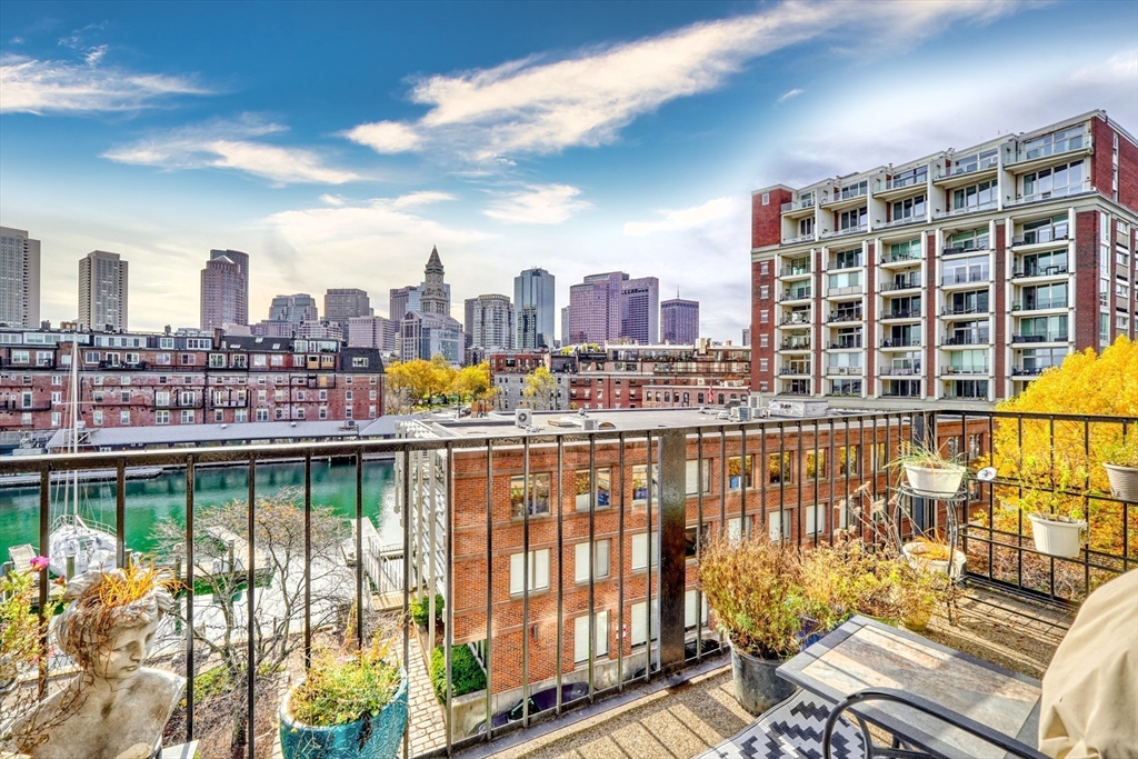 28-32 Atlantic Avenue, Unit 424 Boston, MA 02110 - Photo 27 of 38 a view of a balcony with city view