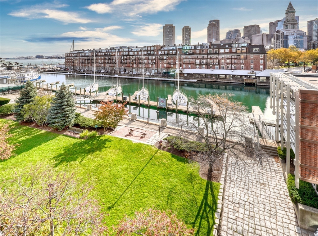 28-32 Atlantic Avenue, Unit 424 Boston, MA 02110 - Photo 29 of 38 a view of a city from a lake