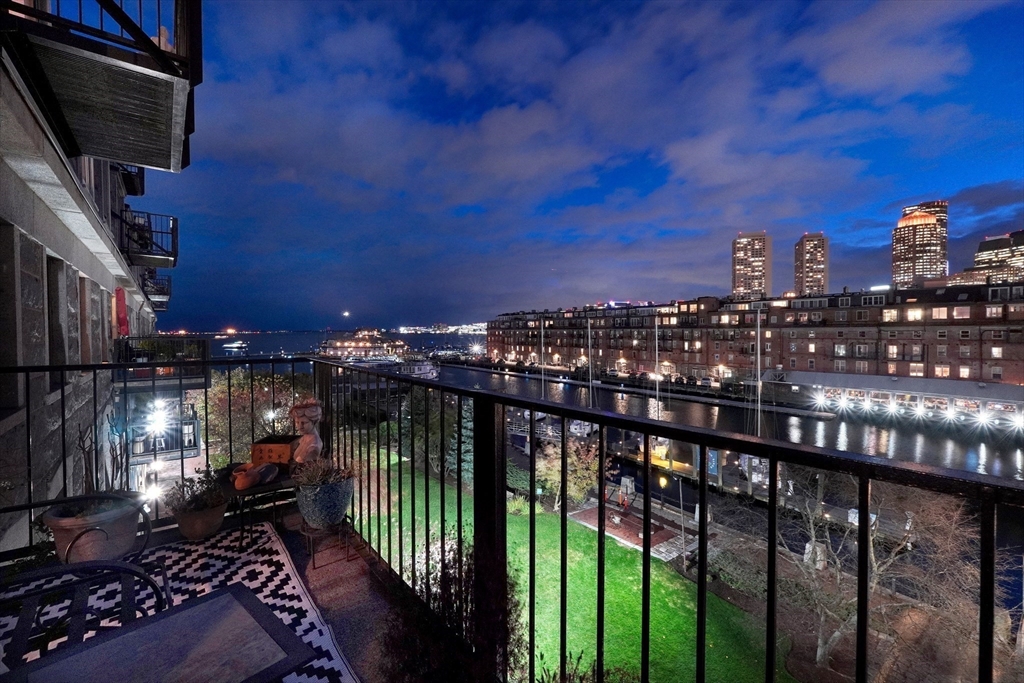 28-32 Atlantic Avenue, Unit 424 Boston, MA 02110 - Photo 35 of 38 a city view from a balcony