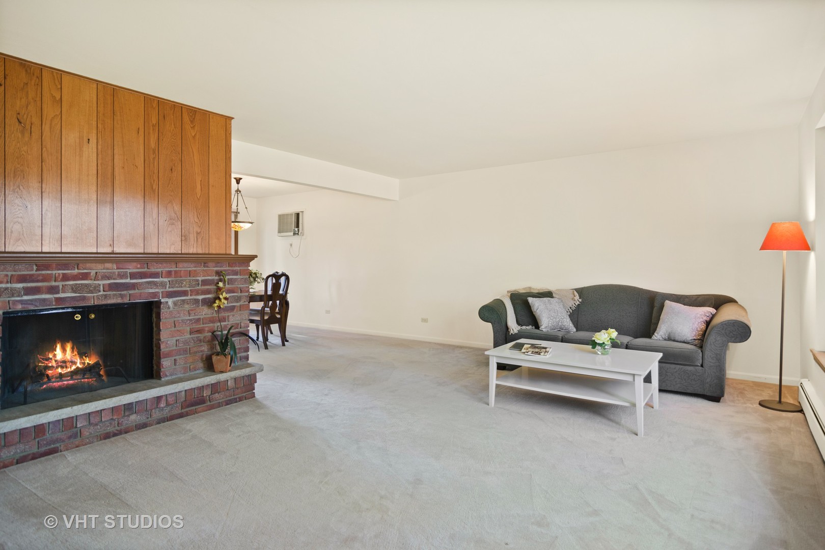 975 Ruth Drive Elgin, IL 60123 - Photo 2 of 17 a living room with furniture and a fireplace