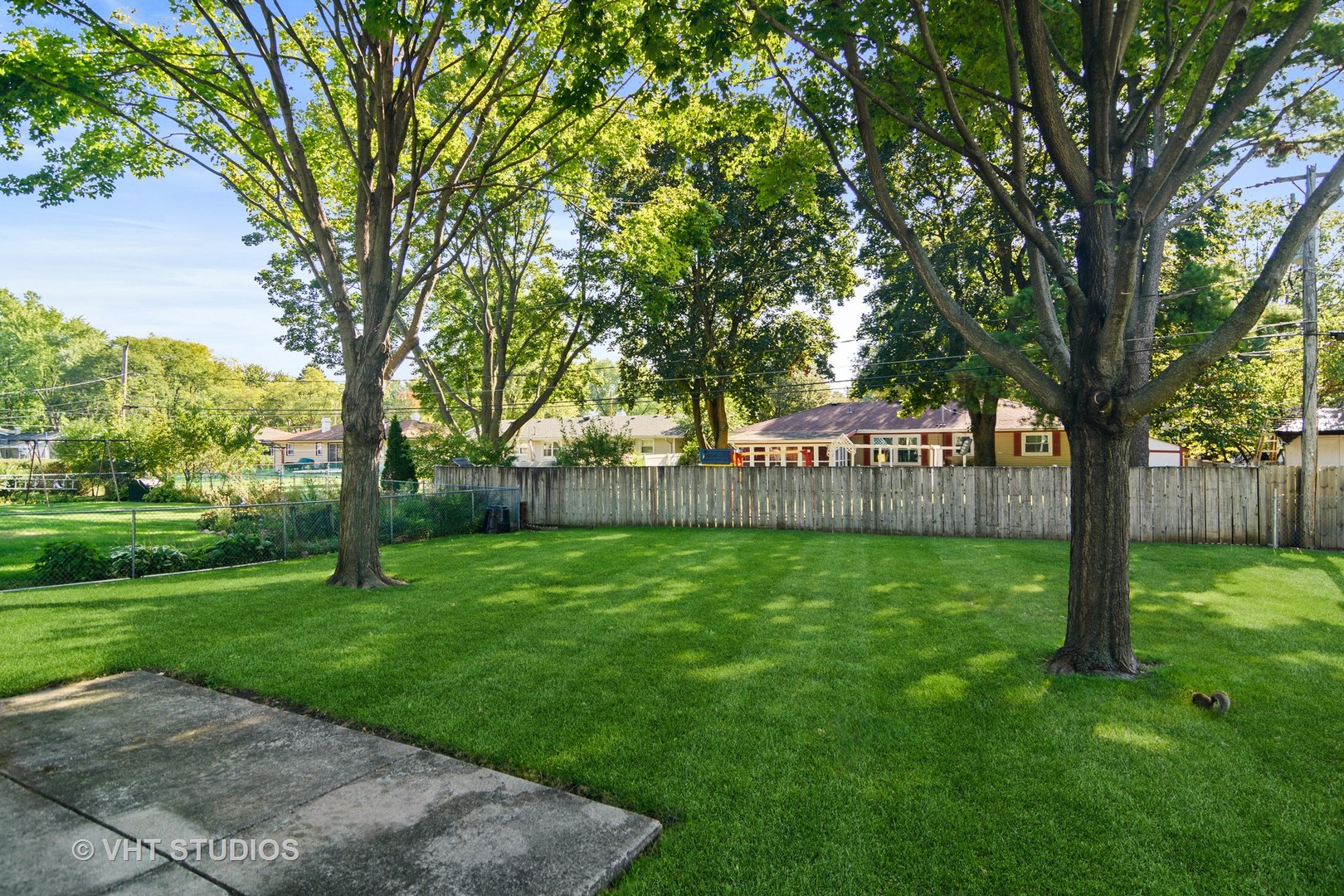 975 Ruth Drive Elgin, IL 60123 - Photo 16 of 17 a view of a backyard with a trees