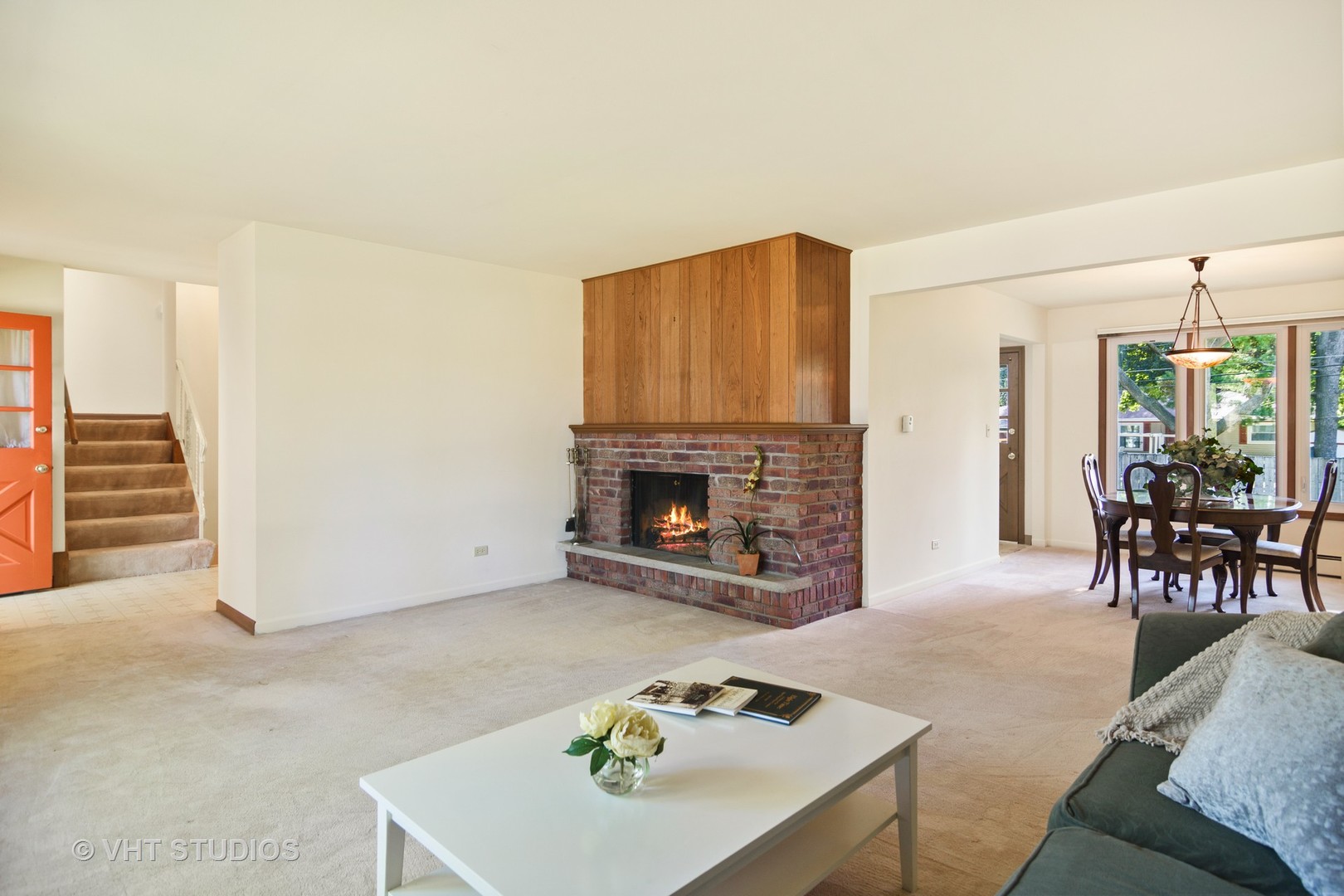 975 Ruth Drive Elgin, IL 60123 - Photo 4 of 17 a living room with furniture and a fireplace
