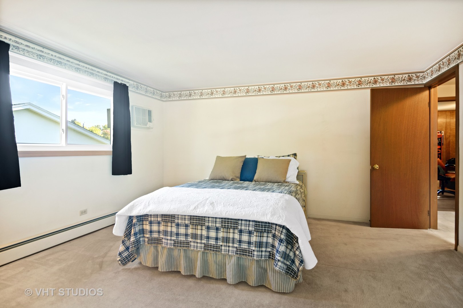 975 Ruth Drive Elgin, IL 60123 - Photo 10 of 17 a bedroom with a bed and window