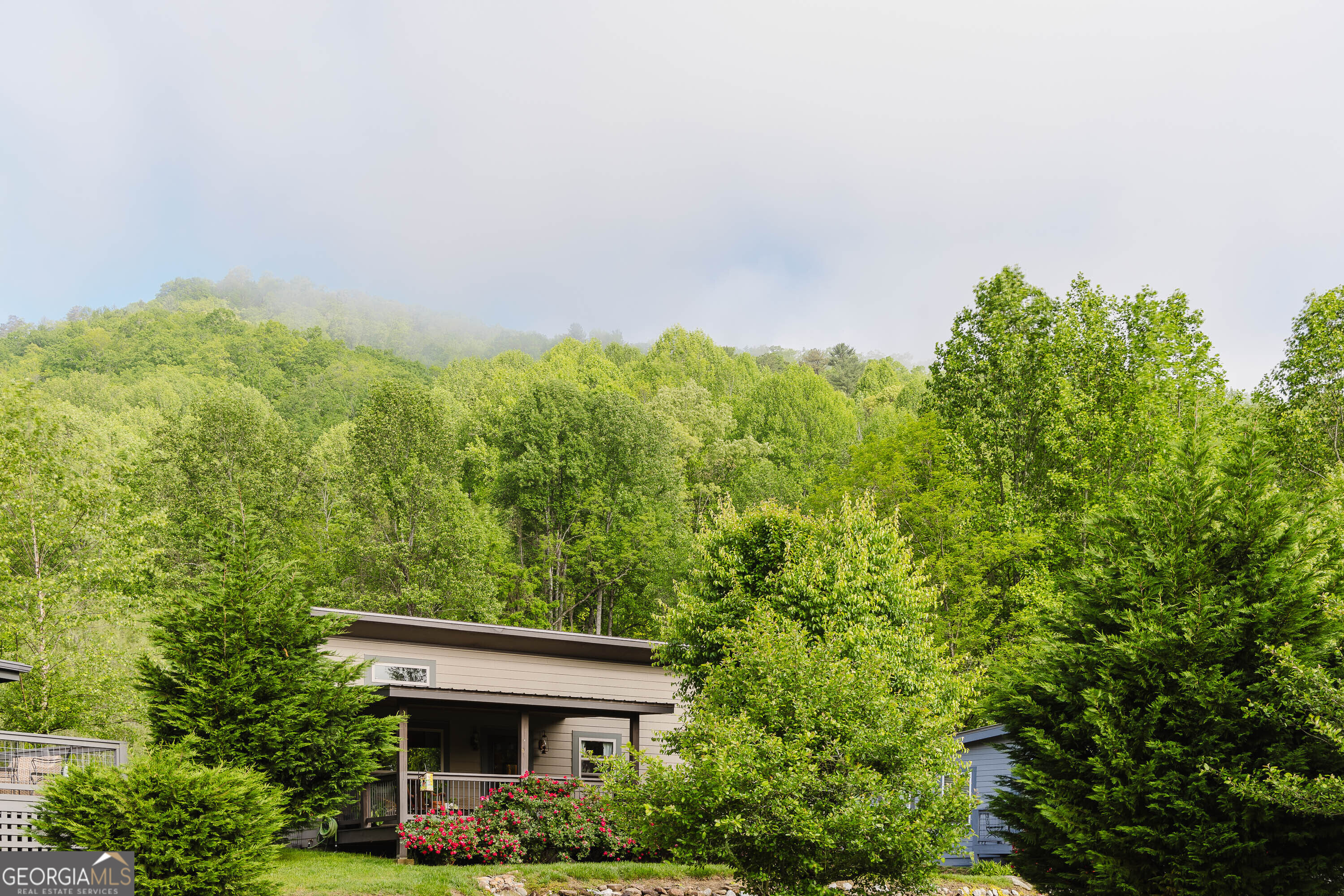 36 Maple Springs Lane Clayton, GA 30525 - Photo 20 of 26 a house view with a garden space