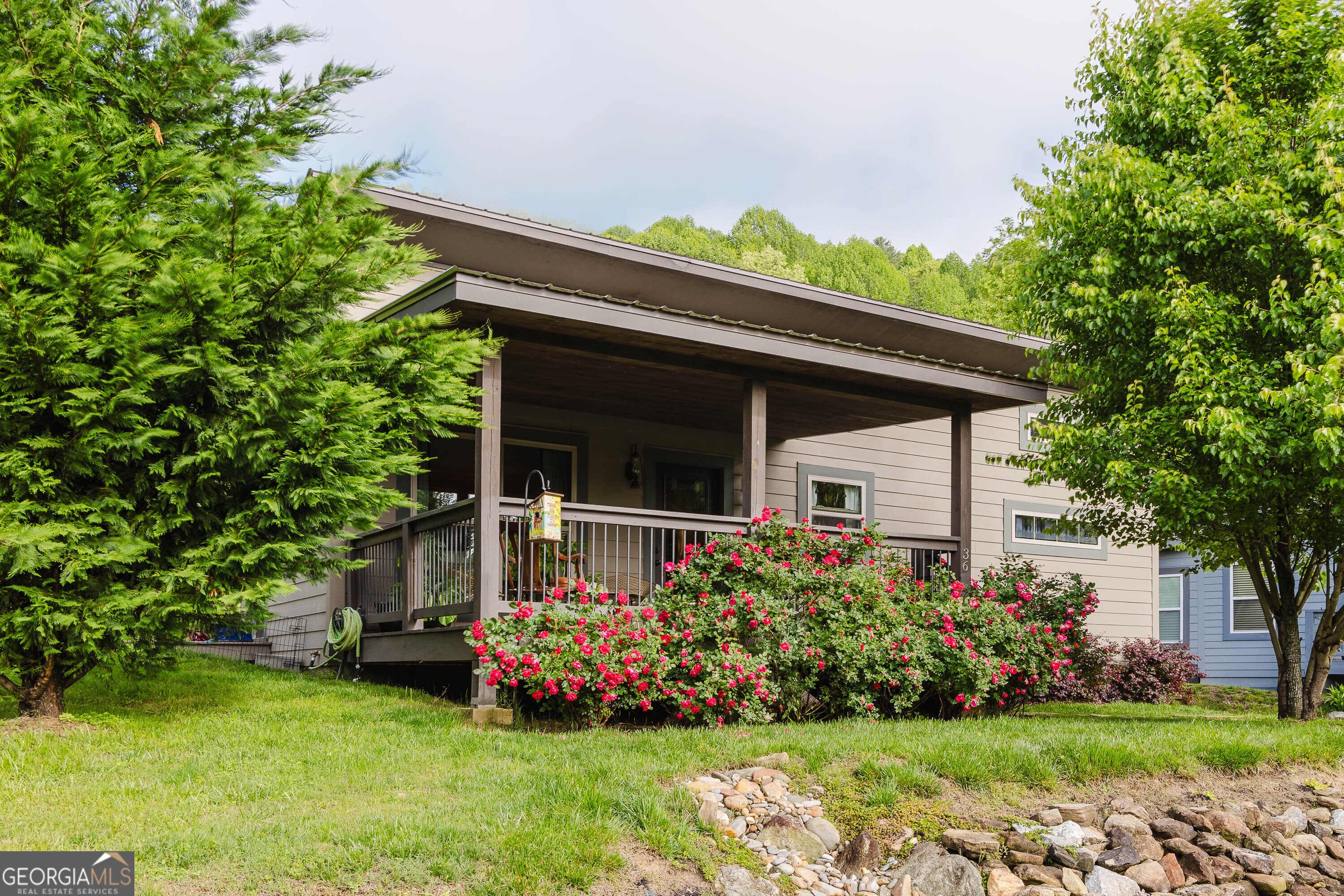 36 Maple Springs Lane Clayton, GA 30525 - Photo 21 of 26 a view of house with garden and entertaining space