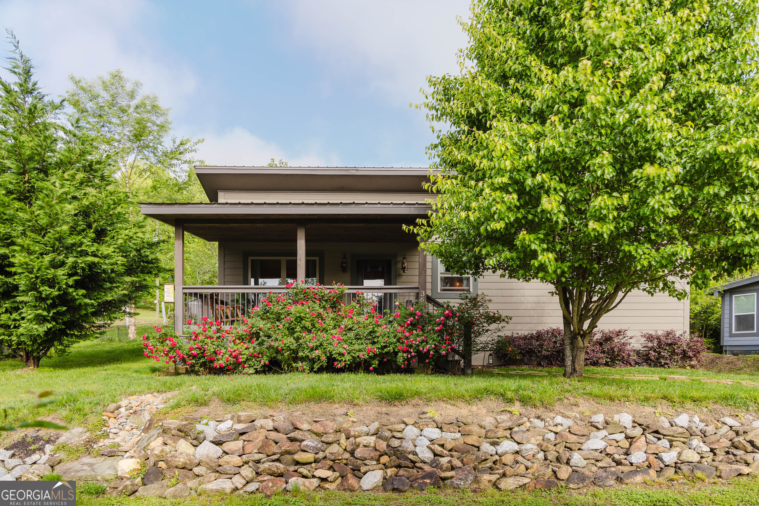36 Maple Springs Lane Clayton, GA 30525 - Photo 22 of 26 front view of house with a yard