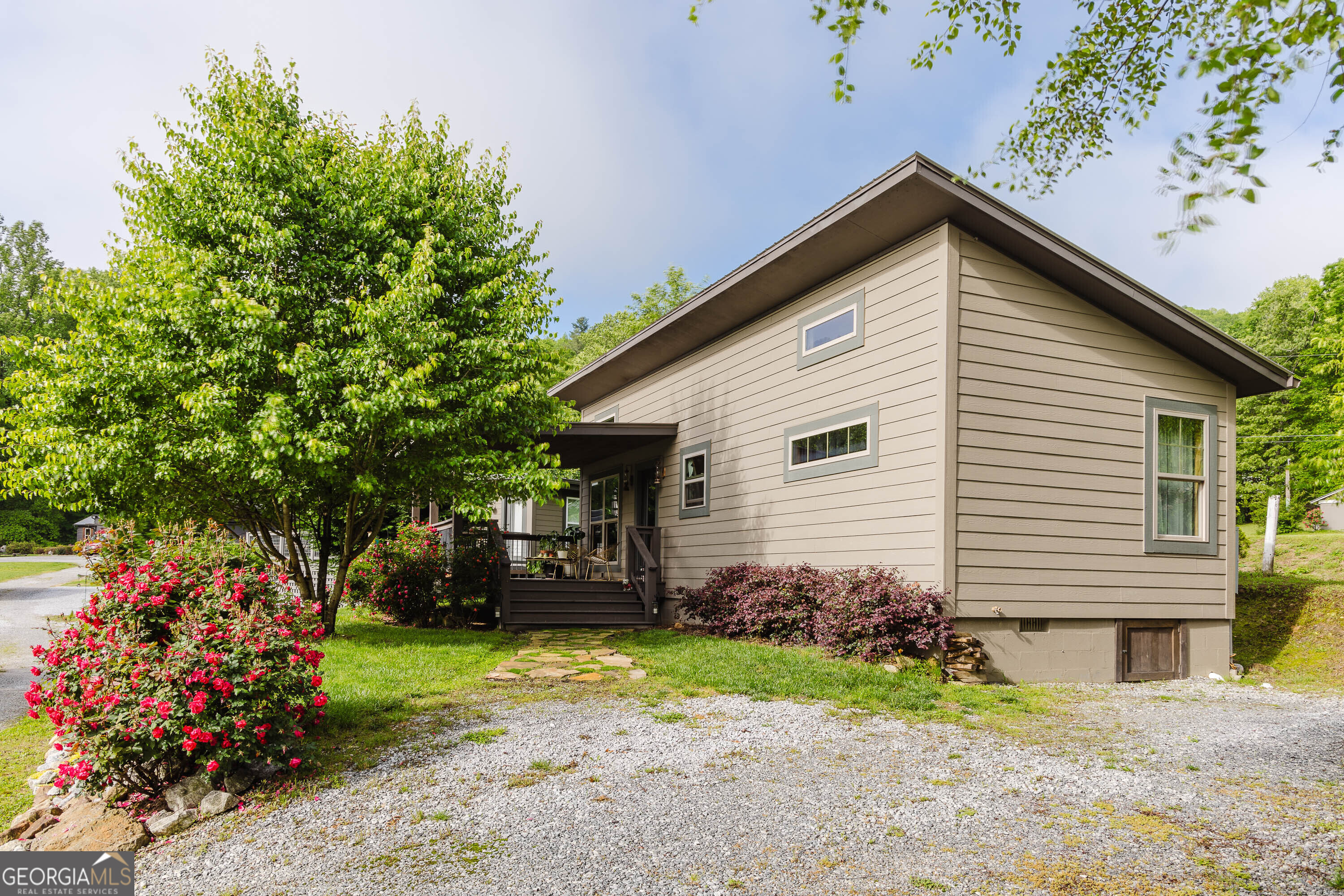 36 Maple Springs Lane Clayton, GA 30525 - Photo 23 of 26 a front view of a house with a yard