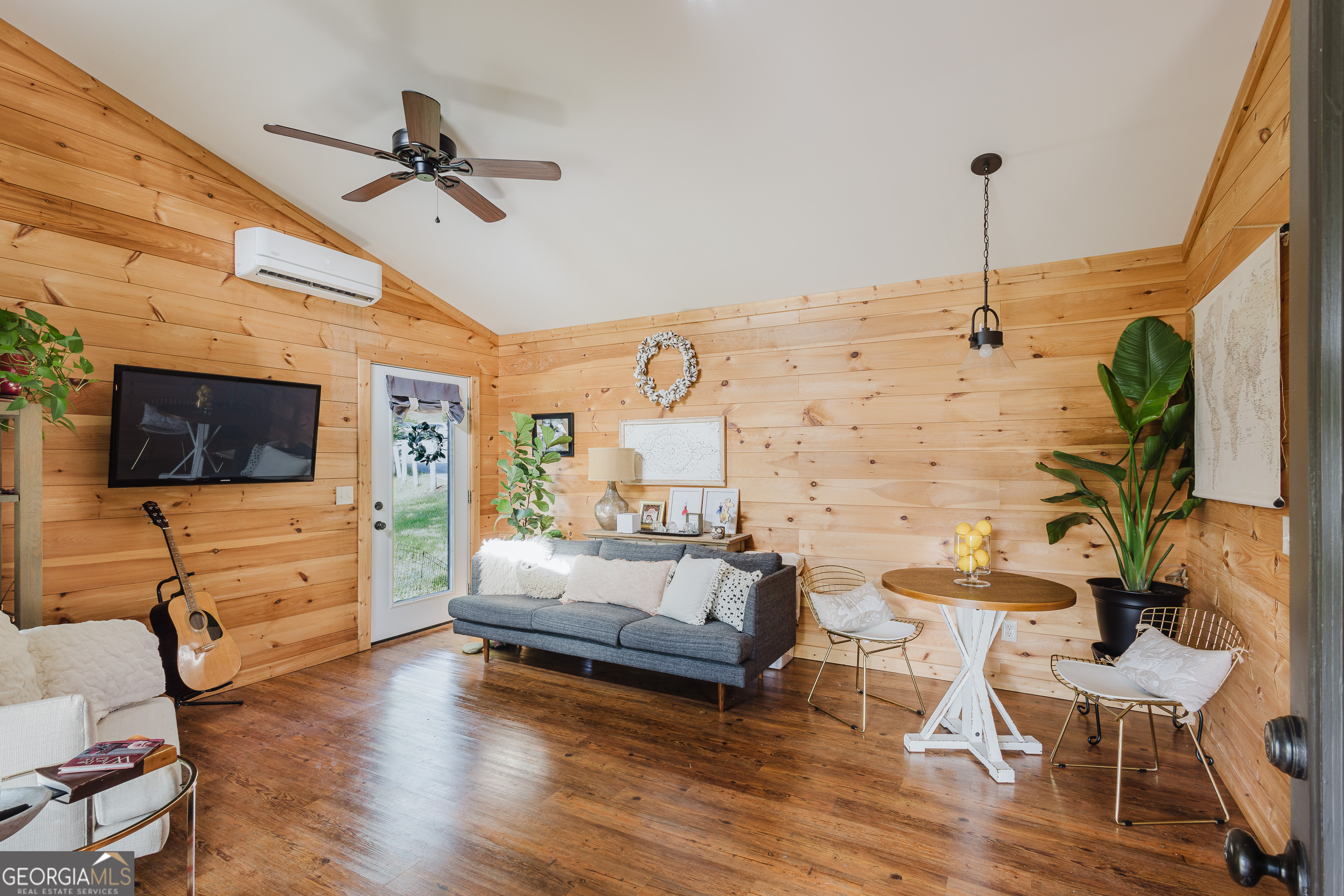 36 Maple Springs Lane Clayton, GA 30525 - Photo 7 of 26 a living room with furniture and a flat screen tv