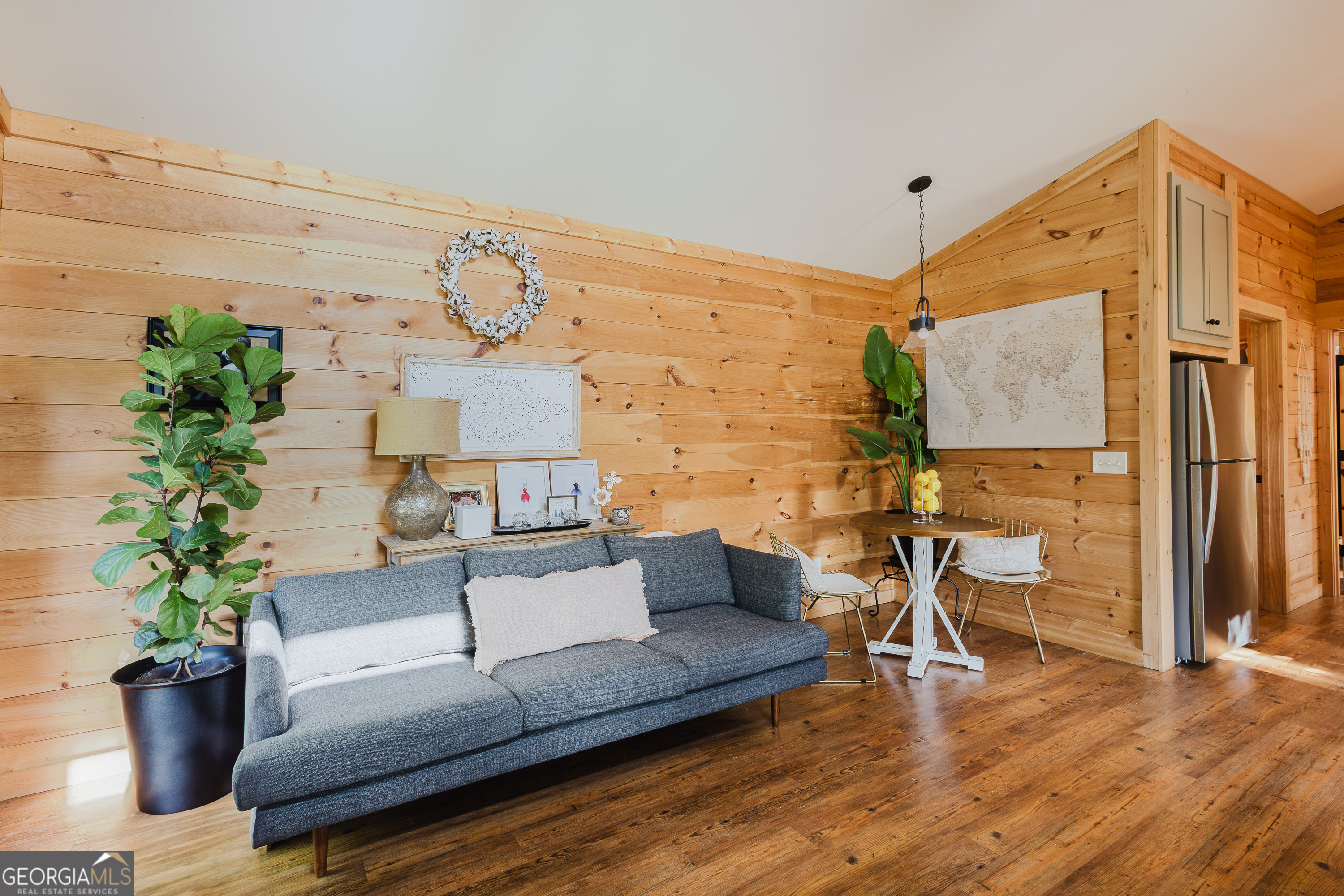 36 Maple Springs Lane Clayton, GA 30525 - Photo 8 of 26 a living room with furniture and a potted plant