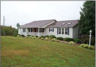 7177 Spring Garden Road Blairs, VA 24527 - Photo 1 of 1 a front view of a house with a yard