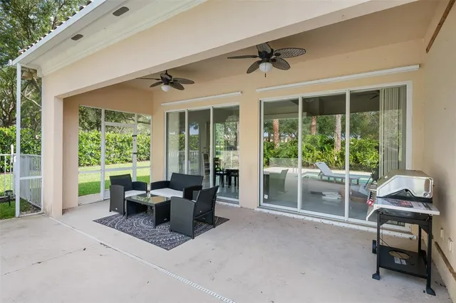 a living room with furniture and windows