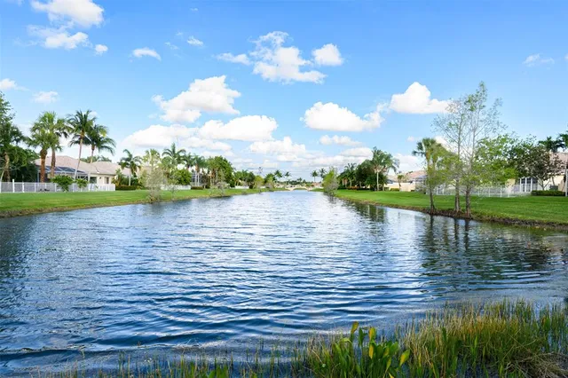 a view of a lake with a big yard