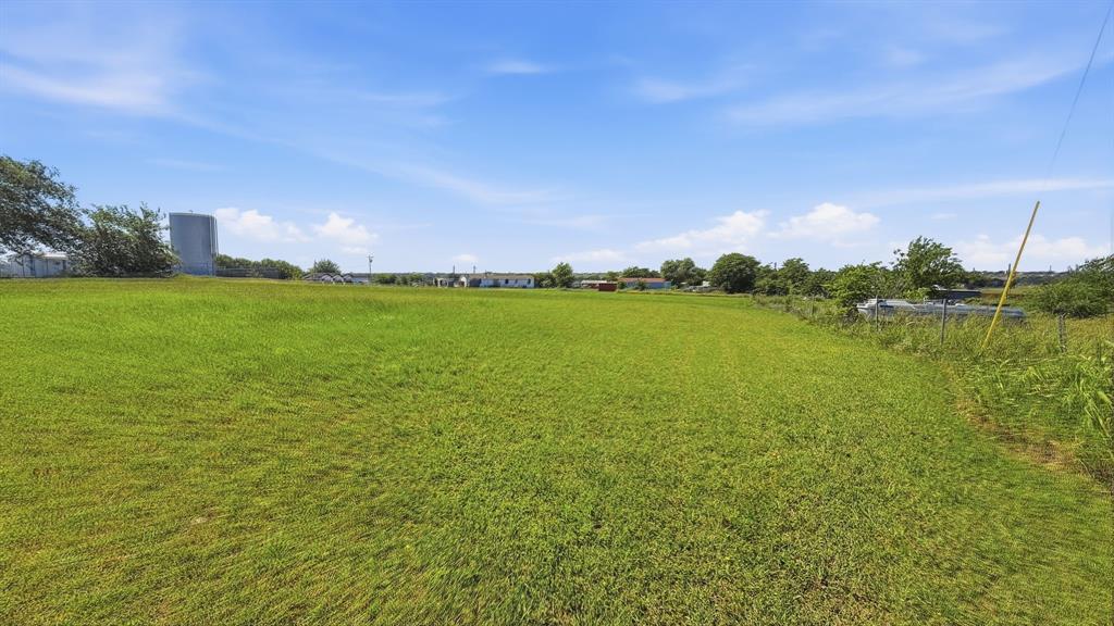185 Private Road 4437 Rhome, TX 76078 - Photo 26 of 28 Expansive, undeveloped parcel featuring a wide-open grassy field