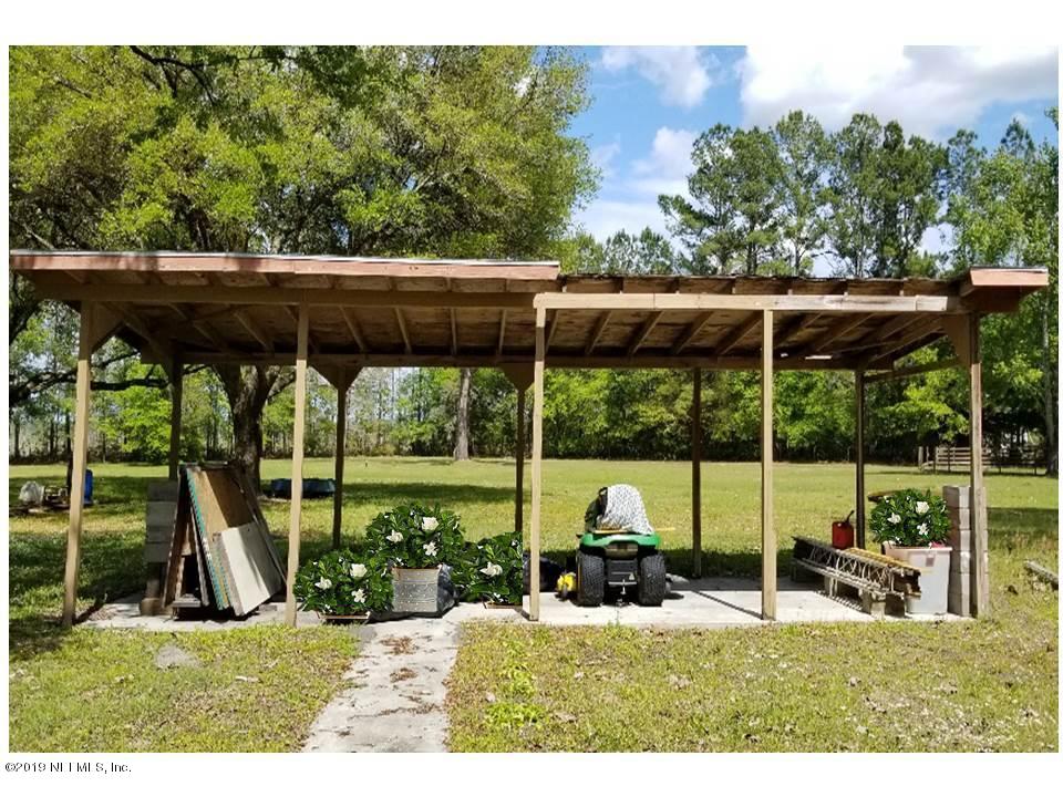 5209 Yellow Water Road Jacksonville, FL 32234 - Photo 20 of 25 Covered Area for Lawn Equip.
