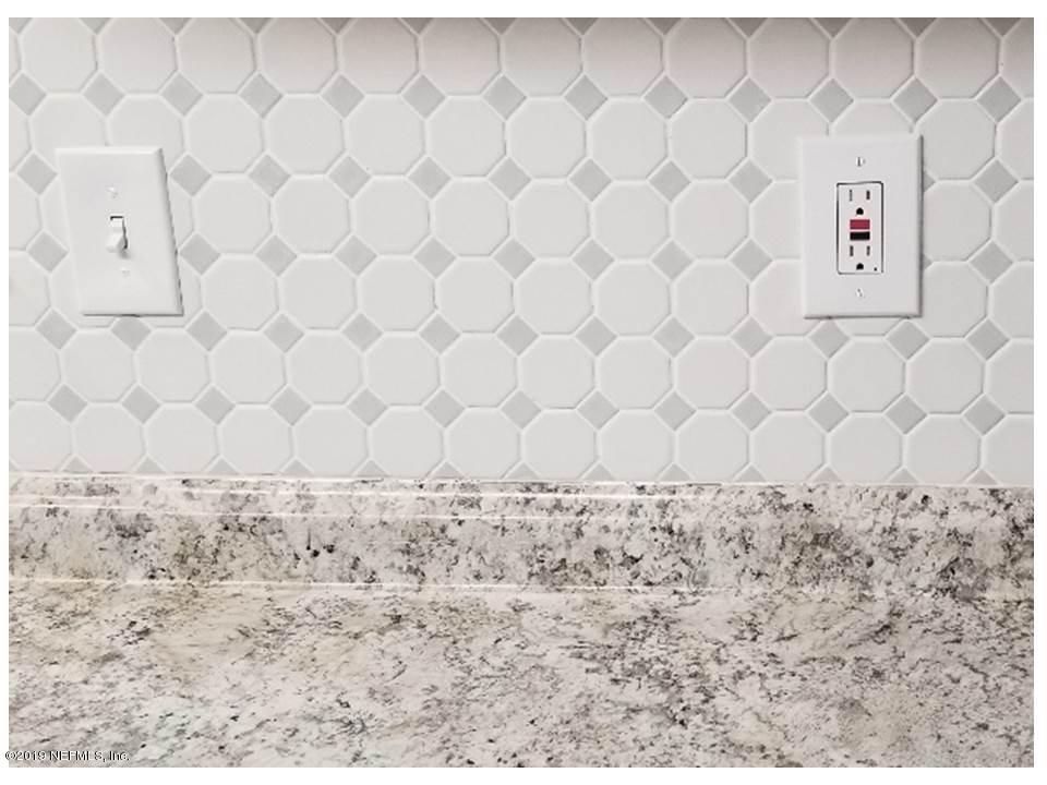 5209 Yellow Water Road Jacksonville, FL 32234 - Photo 8 of 25 Counter top and backsplash