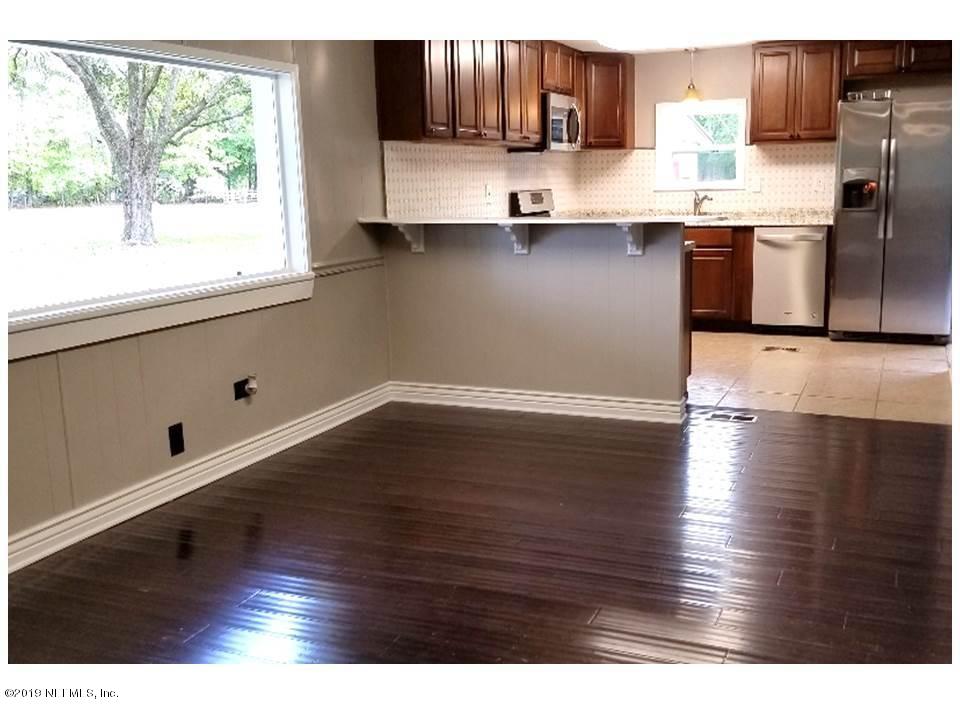 5209 Yellow Water Road Jacksonville, FL 32234 - Photo 9 of 25 Dining room and kitchen