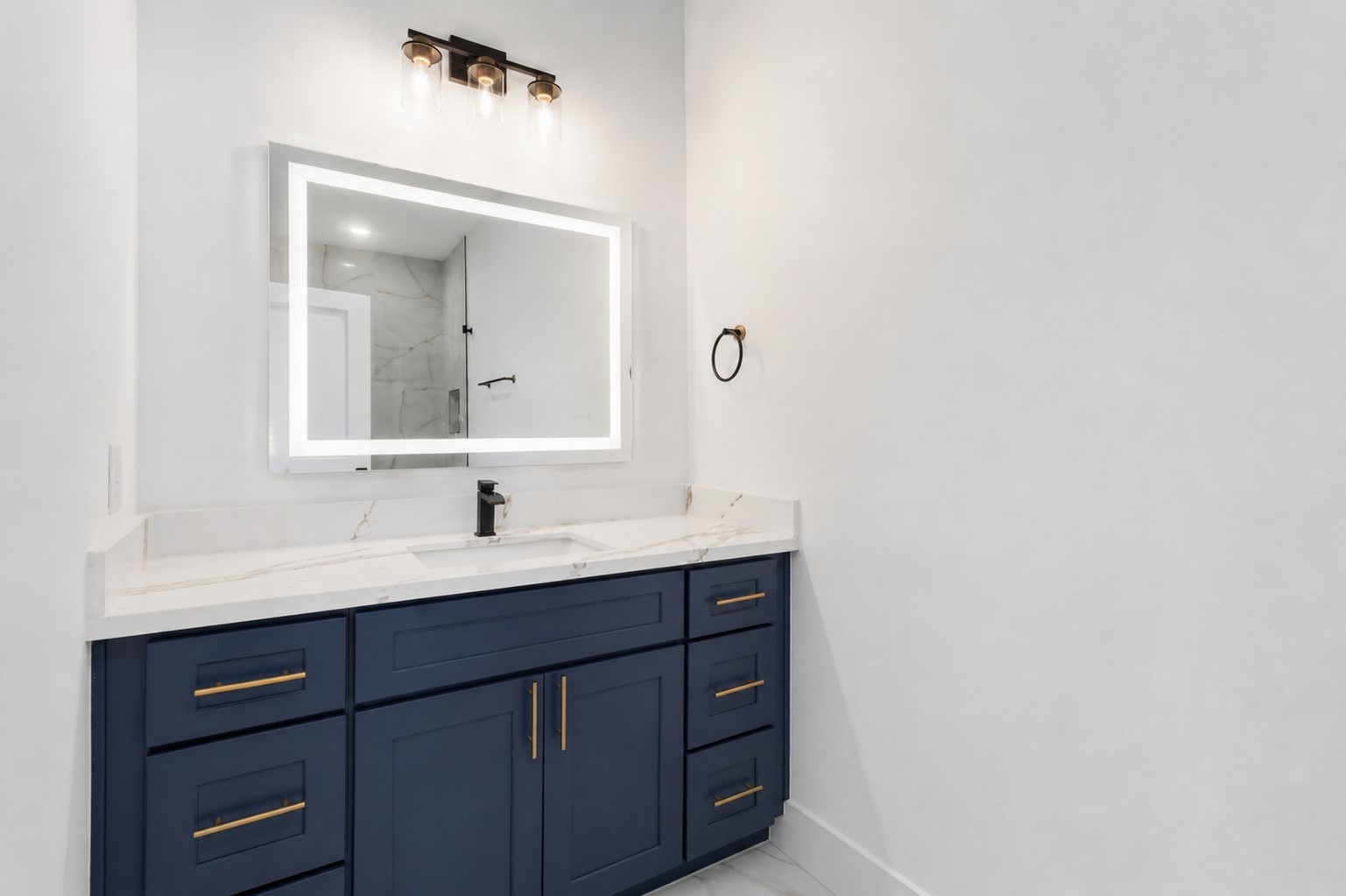 4606 Mallow Street, Unit B Houston, TX 77051 - Photo 20 of 25 a bathroom with a sink and a mirror
