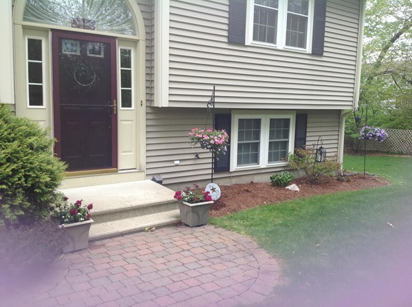 65 Prescott Street Rutland, MA 01543 - Photo 3 of 28 a white house with tree in front of it