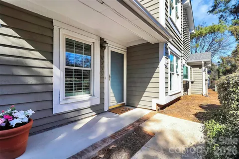 a view of a house with a porch
