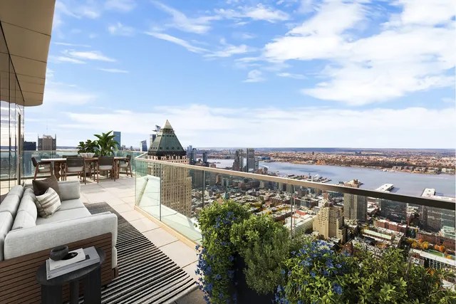 a view of a balcony with city view